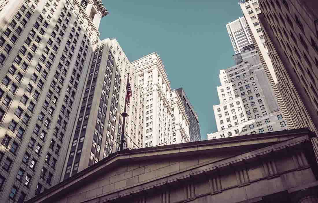 View of blue sky and buildings in a city's downtown area.