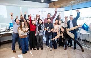 Plante Moran technology consulting team celebrating their recognition as Informatica's Partner of the Year.