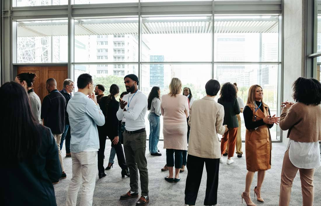 International business professionals milling around.