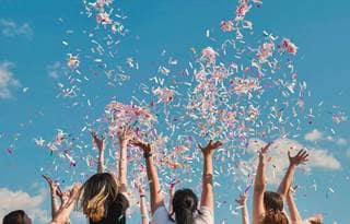People celebrating with confetti.