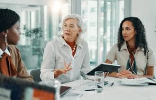 Group of women in a meeting at work.