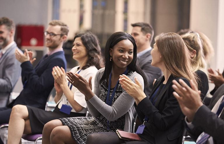 women clapping