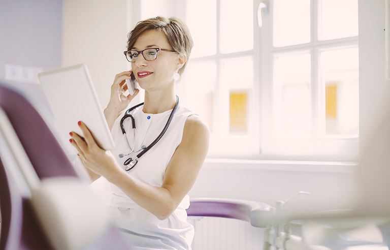 Female doctor is working in the surgery