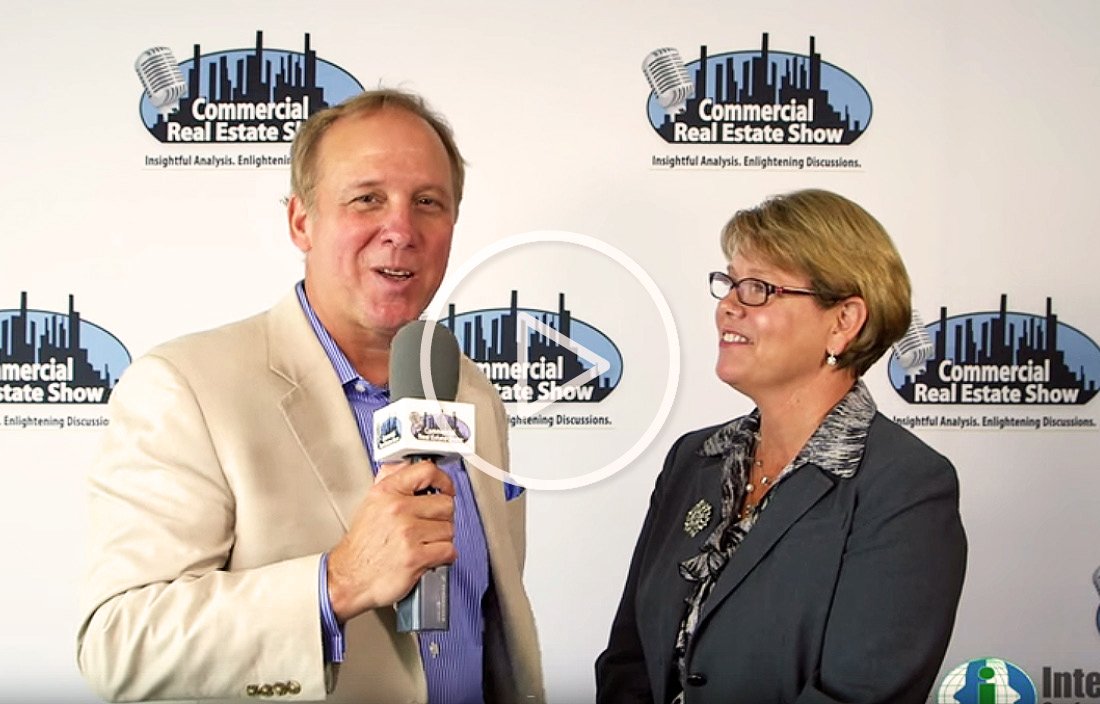 Dana Wollschlager being interviewed by the Commercial Real Estate Show