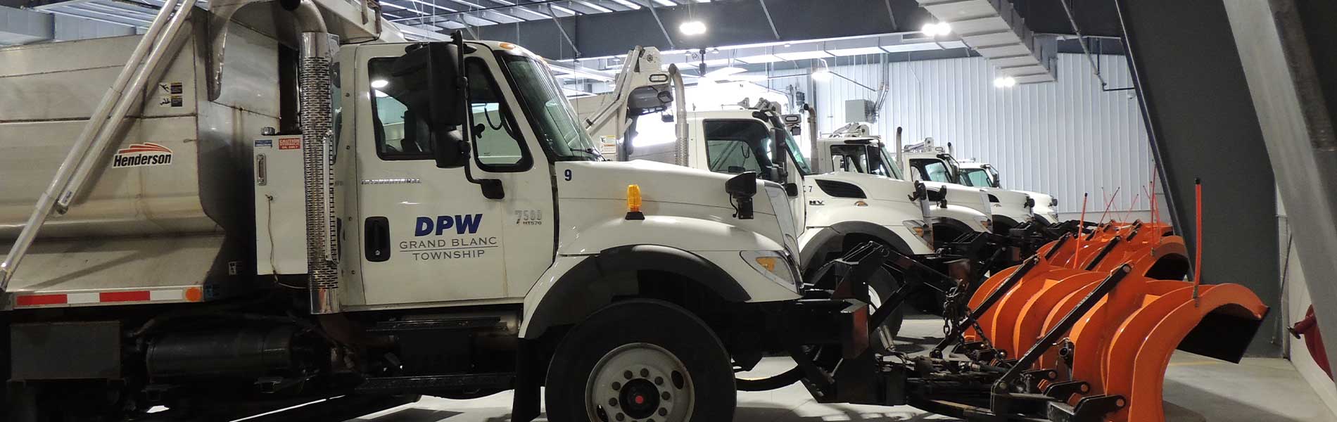DPW trucks with snow plows.