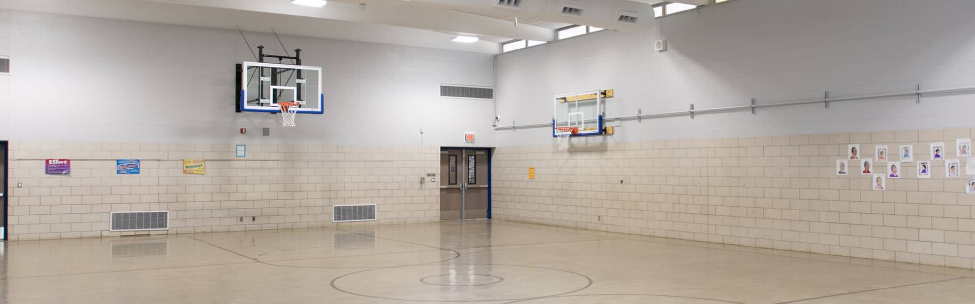 Basketball court in Southfield Public School building.