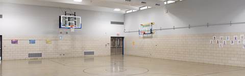 Basketball court in Southfield Public School building.