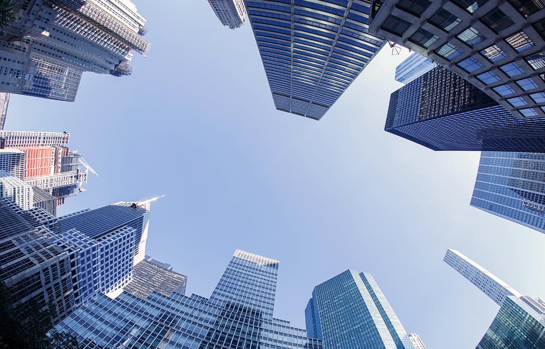 View of skyscraper office buildings as seen from the ground looking up