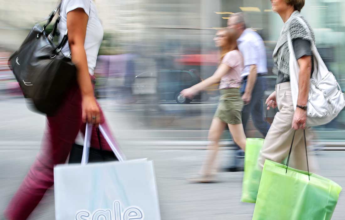 Consumers shopping and carries their shopping bags 