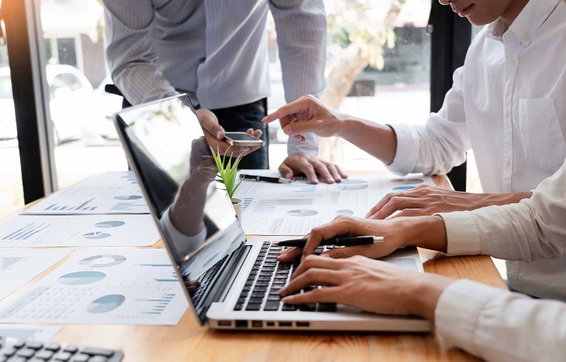 Person typing on a computer.