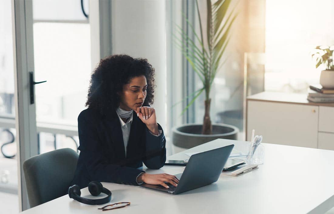 Woman looking at a computer screen.