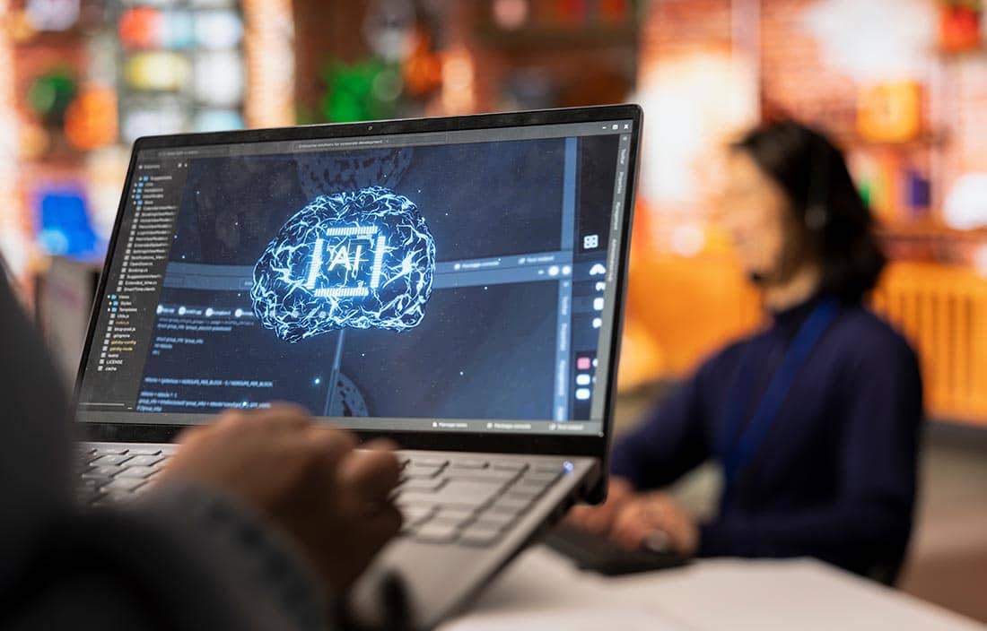 Computer that has the words "AI" on it.